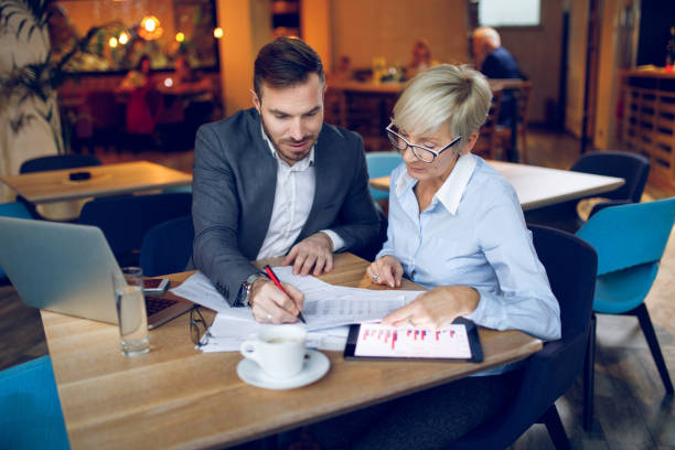 istock Young man explaining his business plans to his colleague 918873908
