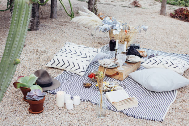 istock Romantic picnic in park in bohemian style 918876808