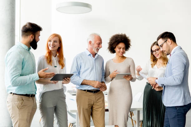 istock Multiracial business people standing in the office 918893162