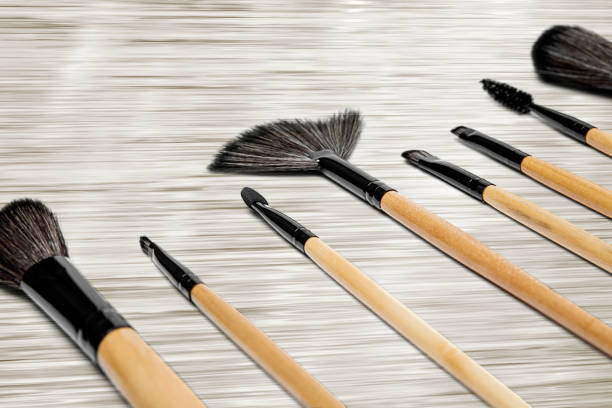 istock Cosmetic brushes for makeup on the table 918905536