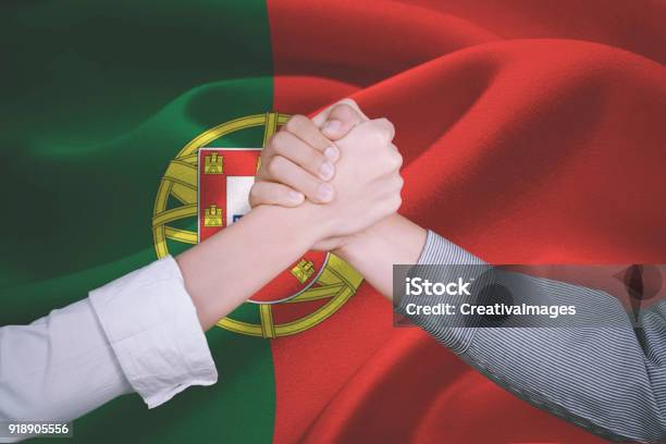 Hands Of Business People Near Portugal Flag Stock Photo - Download Image Now - Adult, Agreement, Ambassador