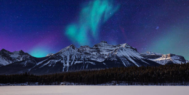 Night sky at Mount Assiniboine in winter from Nub peak. The Landscape of Mount Assiniboine, the Queen of Canadian Rockies, British Columbia, Canada. Beautiful mountains near Banff National park.