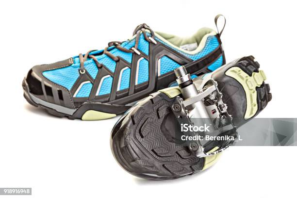 Pair Of Bicycle Shoes With A Pedal Attached To The Sole Spd System Stock Photo - Download Image Now