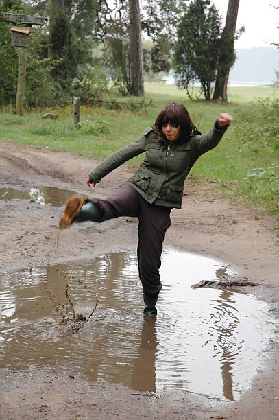 istock Girl in a puddle 91892127