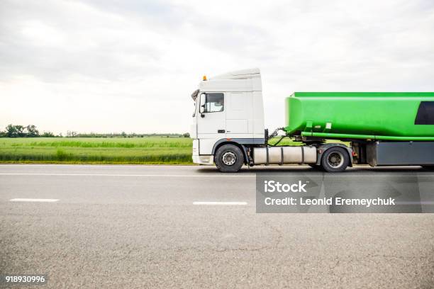Transportation Of Flammable Liquids Stock Photo - Download Image Now - Agricultural Field, Allegory Painting, Asphalt