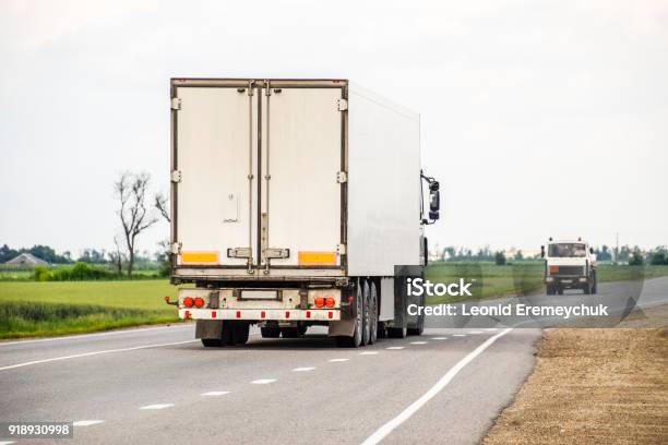 Freight Vehicles On The Track Freight Car Truck Stock Photo - Download Image Now - Semi-Truck, Truck Driver, Log Cabin