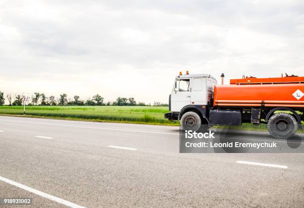 Transportation Of Flammable Liquids Stock Photo - Download Image Now - Agricultural Field, Allegory Painting, Asphalt
