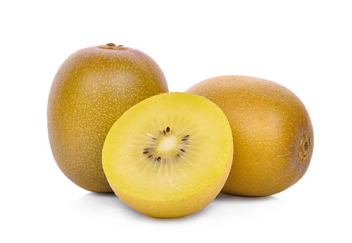 Stock photo showing a close-up view of healthy eating image of a group of two and a half Chinese gooseberry (kiwi).