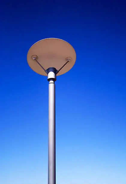 Street lamp in the Riverside park of Manhattan in the New York city against clear blue sky