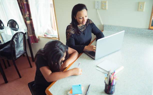 istock Mother home schooling. 918933886