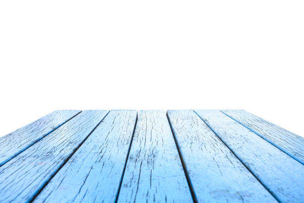 istock Empty top of wooden table or counter isolated on white background 918933916