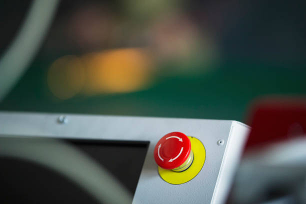 istock Red emergency stop switch reset button on machinery industry 918933934