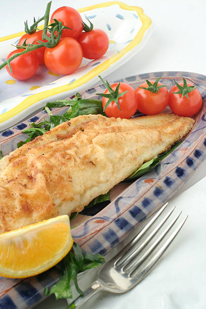 istock fish dinner and salad; ceramic platters 91893498