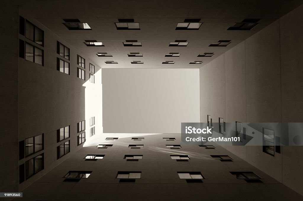 Architectural Archetype: The inner court a interior court/yard surrounded by four walls. abstract feeling through strong geometric structure. Quadtoned to bring out geometry. Architecture Stock Photo