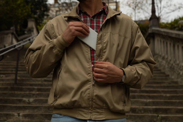 istock Modern guy holding his cellphone in pocket. 918938208