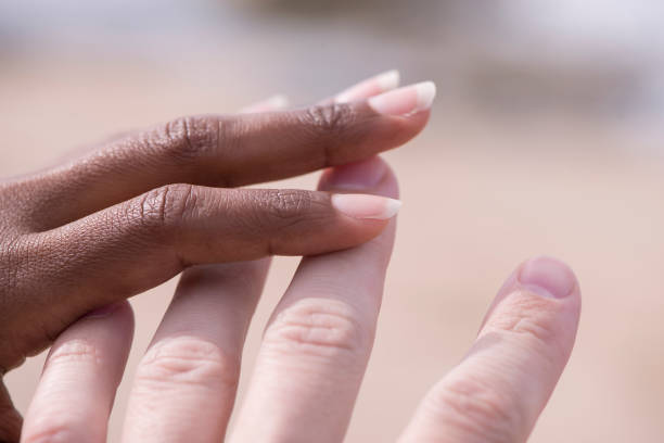 istock Close up couple touching fingers. 918938712