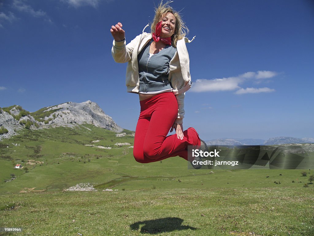 Menina de salto - Foto de stock de Azul royalty-free