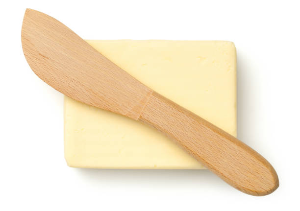 Butter with Knife Isolated on White Background