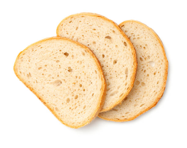 Slices of Bread Isolated on White Background Slices of bread isolated on white background. Top view slice of bread stock pictures, royalty-free photos & images