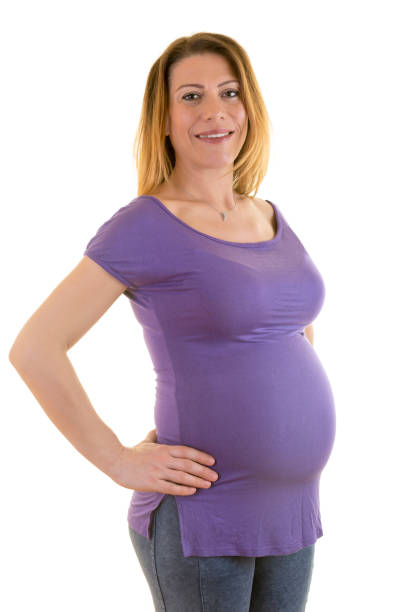 pregnant woman touching belly isolated on white background