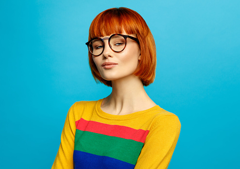 Portrait of beautiful female model with glasses