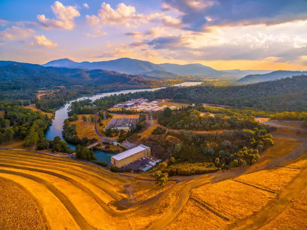 Photo of Scenic aerial view of Eildon Dam and Goulburn River at golden sunset