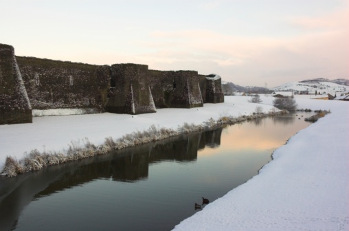 Caerphilly Castle in South Wales. Taken in the snow of March 2005. A great back drop for a Christmas card maybe?