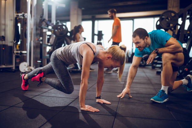 istock Young woman doing stretching exercise 918949496