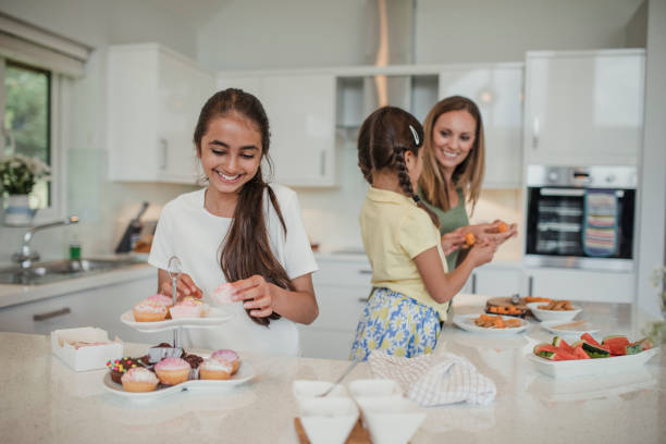 istock Young Girl Sorting the Cakes 918949594