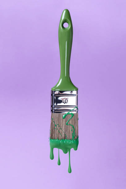 istock brush with green paint, 918950290