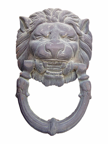 A closeup of Jaguar head metal ornament