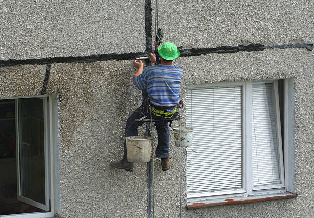 istock renovation worker on a block of flats 91895971