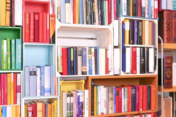 istock Colorful book shelves packed with books 918969838