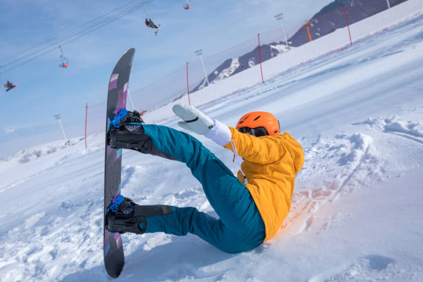 istock one young woman snowboarding in winter mountains 918970094