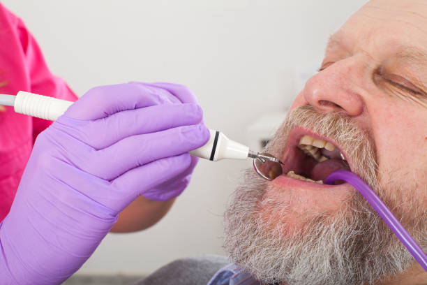 istock Elderly patient on dental treatment 918975598