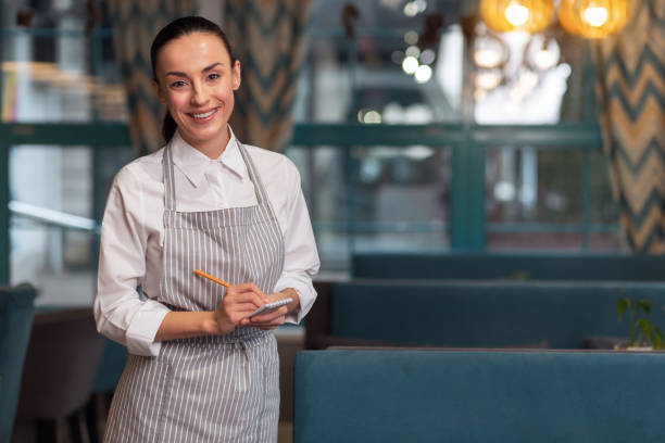 istock Positive happy waitress ready to work 918978372