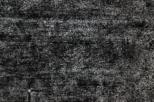 Textura de tiza de color blanco de Grunge sobre fondo de pizarra photo