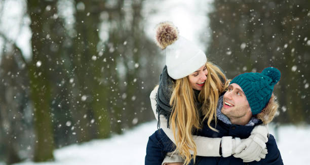 istock Couple in love in winter scenery 918985418