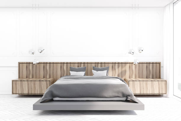 istock White and wooden bedroom, gray bed 918985490