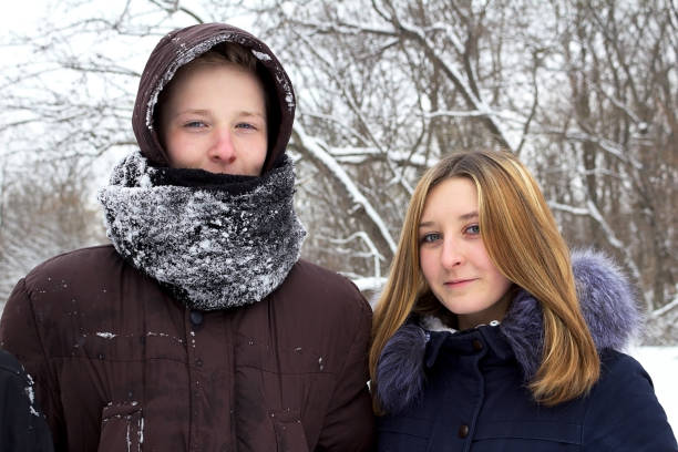 istock The guy is standing next to a young blonde girl 918989740
