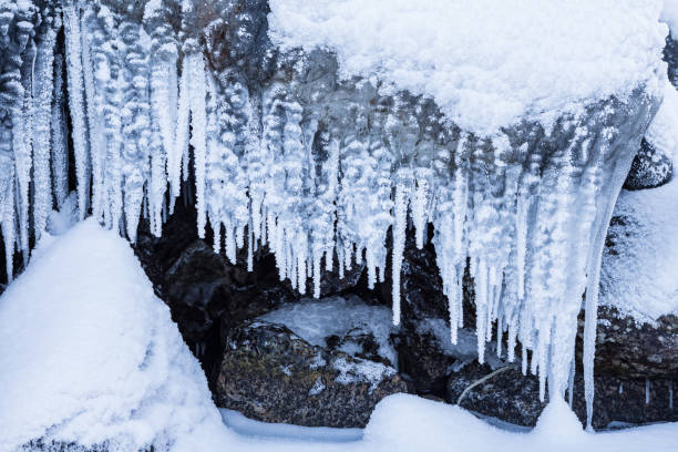 istock Row of frosty icicles in nature 918992382