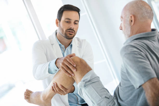 istock Senior man having medical exam. 918999188