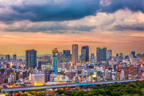 Osaka, Japan Skyline Osaka, Japan skyline at twilight. osaka city photos stock pictures, royalty-free photos & images
