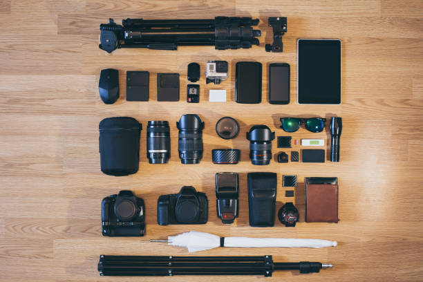 istock Professional photo camera kit is neatly folded on wood surface 919006028
