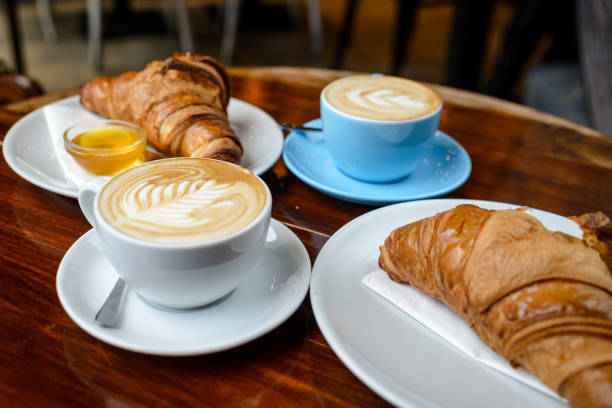 istock Cappuccino and fresh croissants 919011278
