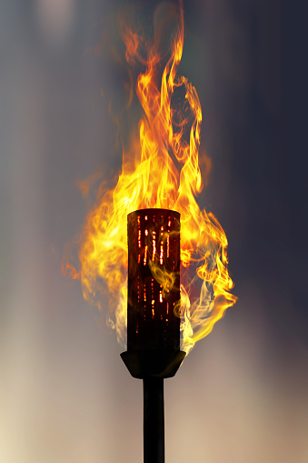 burning torch at night, close up