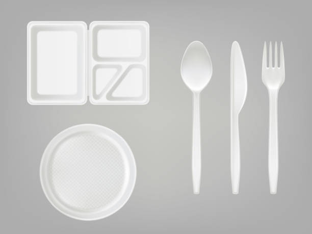 Vector 3d realistic disposable plastic lunch box, plate, spoon, fork, knife. Picnic tableware set on gray background. Vector 3d realistic disposable plastic lunch box with partition, plate, cutlery - spoon, fork, knife. Picnic party tableware isolated icons set on gray background. Template, mockup of eco kitchenware polystyrene box stock illustrations