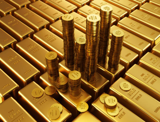 istock Gold bars and golden coins. 919049394