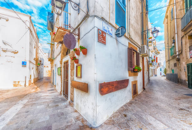 Buildings and street in old town Monopoli Puglia, Italy monopoli puglia stock pictures, royalty-free photos & images