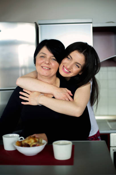istock Happy mother and daughter portrait 919148820